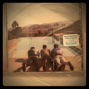 Unopened Jonas Brothers Happiness begins CD .